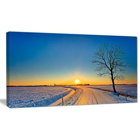 Design Art 'Distant Sunset in Winter' Photographic Print on Wrapped Canvas, Size: 20 inch H x 40 inch W x 1 inch D, Yellow
